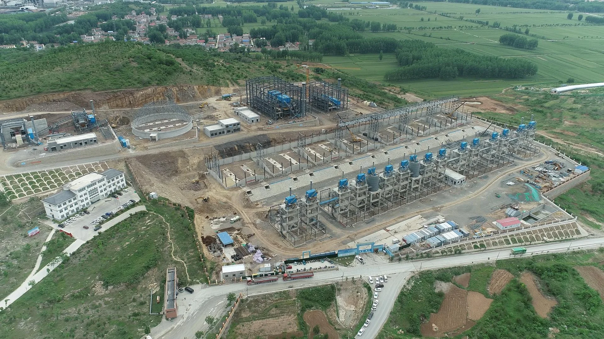 Aerial aggregate production site with conveyor transfer